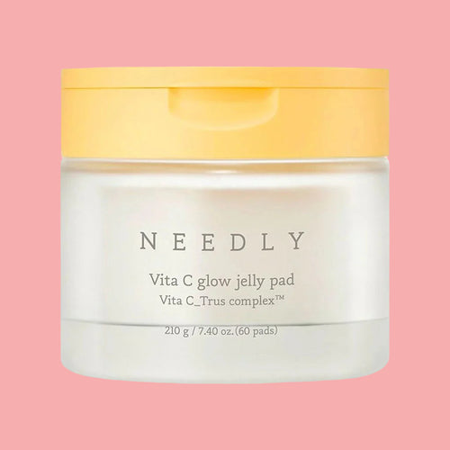 NEEDLY Vita C glow jelly pad with yellow lid on a white background
