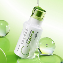 Load image into Gallery viewer, A bottle of beplan Mung Bean Pure Stem Cell Serum with a green cap, shown on a bright green background with decorative clear gel spheres and a dripping gel effect.