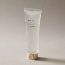 Load image into Gallery viewer, Tube of Aromatica Soothing Aloe Vera Gel on a neutral background