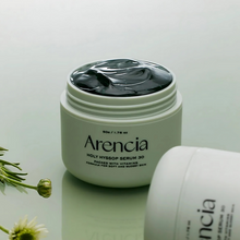 Load image into Gallery viewer, Arencia Holy Hyssop Serum jar with a light green background